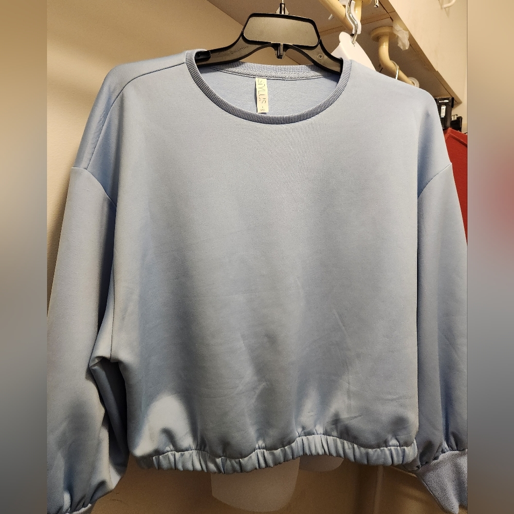 Stylus Baby blue sweater